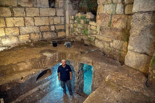 Archeologist Barak Monnickendam-Givon standing at the underground complex in Jerusalem